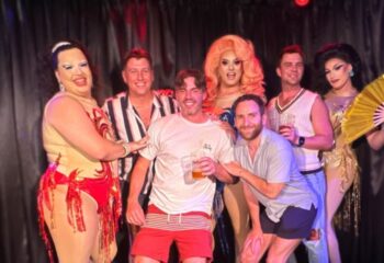 Drag queens and gay men at s-Hotel Richmond, a gay-friendly hotel. Group photo, nightlife, travel advice.
