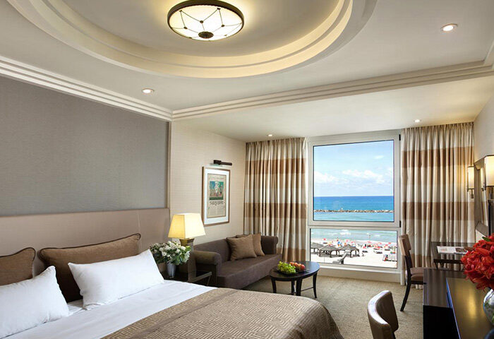 Dan Tel Aviv Hotel room. Luxury beachfront view from this most booked hotel. Gay travel to Israel.