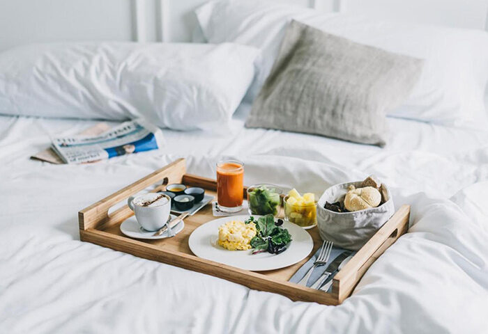 Dear Hotel Madrid breakfast in bed. Gay hotel in Chueca gayborhood with cheap price and rooftop pool. Madrid gay travel.