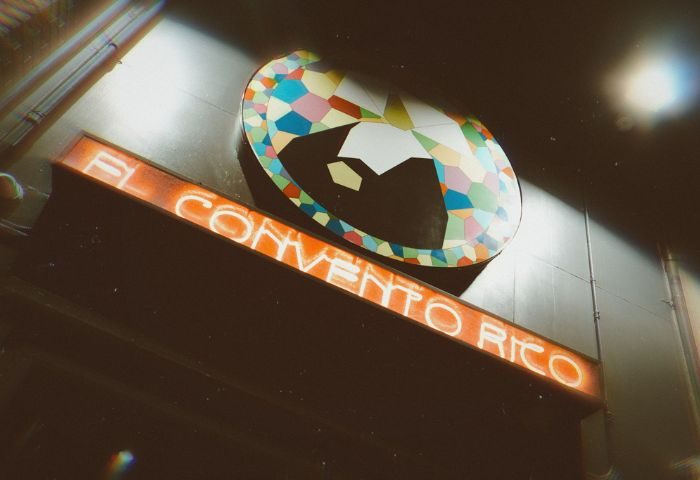 El Convento Rico, Toronto's popular gay night club, features a colorful sign. A must-visit for gay men traveling to Toronto.