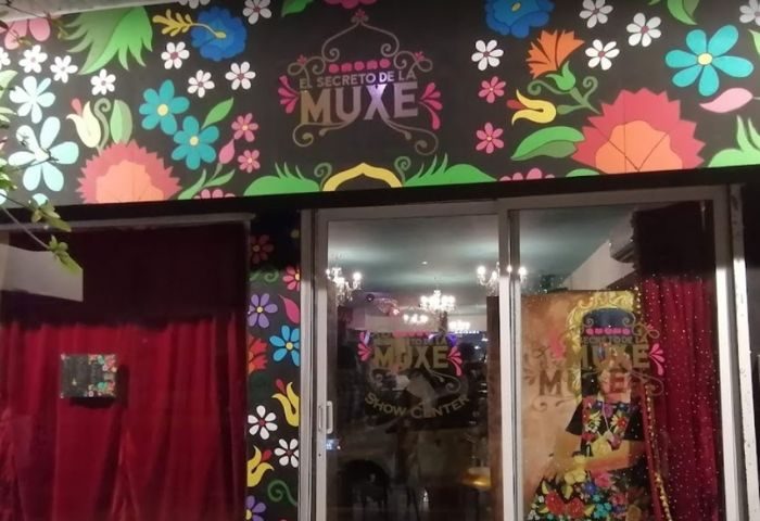 El Secreto de la Muxe gay bar in Puerto Vallarta. Colorful floral mural above the entrance. Gay travel destination, nightlife.