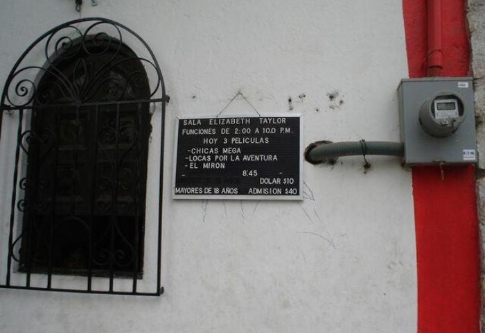 Elizabeth Taylor Theater sign in Puerto Vallarta. Movies: Chicas Mega, Locas por la Aventura, El Miron. Gay cruising spot.