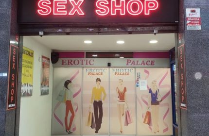 Erotic Palace sex shop in Barcelona. Neon sign above the entrance. Gay cruise club related. Travel advice for gay men.