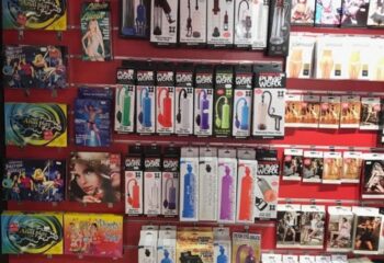 Shelves of gay sex toys at Erotic Palace, a gay cruise club in Madrid. Selection of pumps and anal play items for gay men's pleasure.