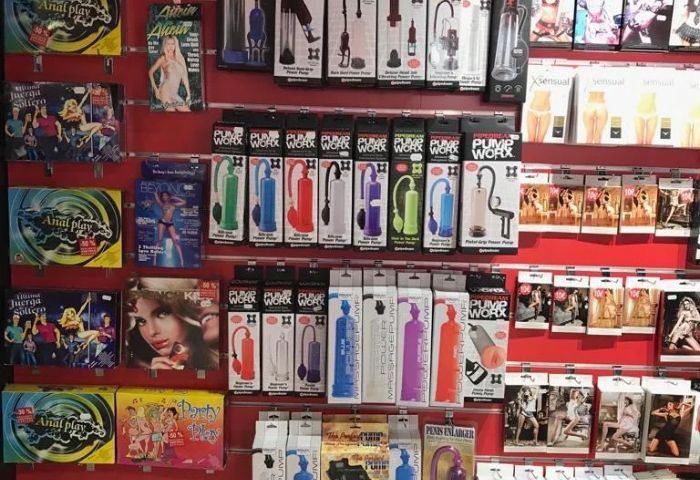 Shelves of gay sex toys at Erotic Palace, a gay cruise club in Madrid. Selection of pumps and anal play items for gay men's pleasure.