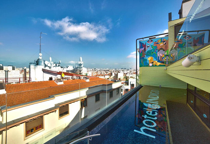 Rooftop pool view at Hotel Indigo Madrid Gran Via, an excellent-location gay hotel in Madrid. Enjoy the city view from this stylish hotel.