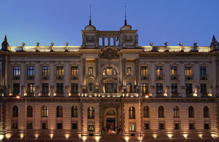 NH Collection Carlo IV, Prague. Luxury hotel exterior at dusk. Excellent location for a gay honeymoon in Old Town.