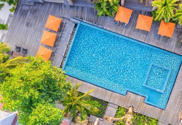 Aerial view of Sai Kaew Beach Resort pool, Koh Samet. Find cheap beachfront gay hotel with swimming pool for gay travelers.