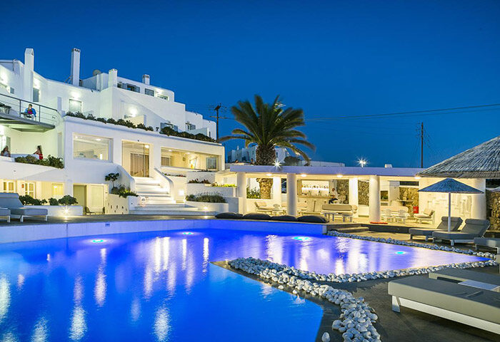 Ilio Maris Gay Hotel Mykonos pool at night. Find last minute deals for a gay hotel with swimming pool in Mykonos. Gay travel advice.