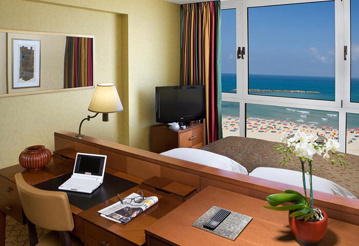 Dan Tel Aviv Hotel room with beachfront view. Luxury gay hotel near Tel Aviv gay bars. Last minute deals available. Beach view.