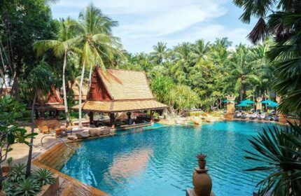 Avani Pattaya Resort pool view. Luxury gay hotel in Pattaya with a swim-up bar. Last-minute deals for gay travelers in Thailand.
