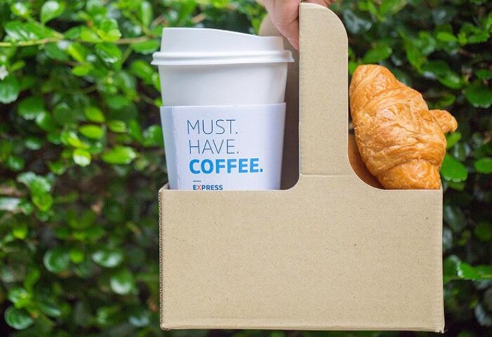 Free hotel breakfast at a gay-friendly Holiday Inn Express in Bangkok. Coffee and croissant in a carrier. Sathorn travel.