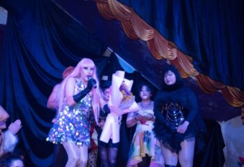 Drag queens performing in Ho Chi Minh City, Vietnam. Full Disclosure gay travel advice. Pink wig, sequins, and black gloves. Nightlife.