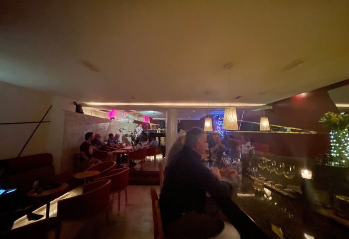 Inside Garbo Piano Bar, a gay-friendly spot in Puerto Vallarta, featuring live music and a lively atmosphere for gay men travelers.