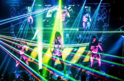 Milan Gate Party: DJ & dancers under laser lights. Gay nightlife travel advice. Milan, Italy.