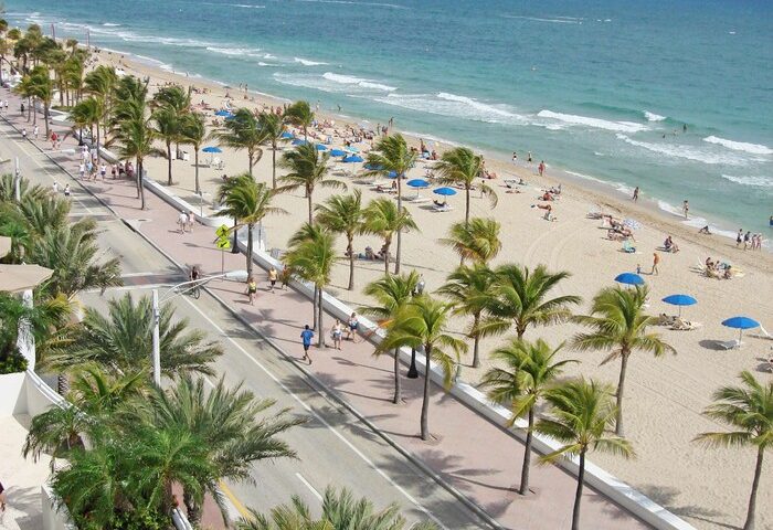 Hilton Fort Lauderdale Beach Resort view. Gay-friendly hotel with beach access, palm trees, and ocean views. Ideal for gay travel and relaxation.