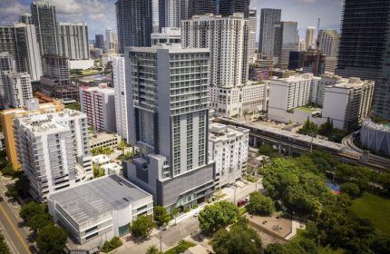 Hotel Indigo Miami Brickell: Gay-friendly hotel aerial view. Modern building in Brickell's skyline. Ideal for gay men's travel in Miami.