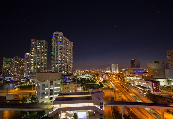 Night view of Downtown Brickell-Port of Miami from a gay-friendly hotel. Skyscrapers and city lights. Comfort Inn & Suites.