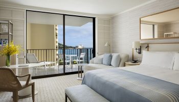 Halekulani Hotel room with ocean view balcony. Gay-friendly hotel featuring a luxurious suite, perfect for gay travel and romantic getaways.