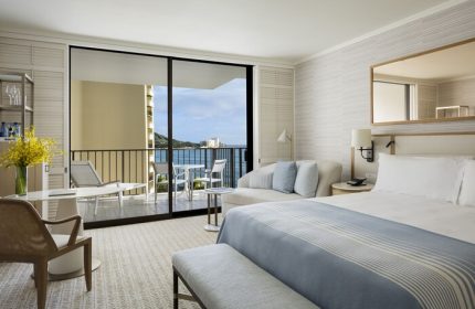 Halekulani Hotel room with ocean view balcony. Gay-friendly hotel featuring a luxurious suite, perfect for gay travel and romantic getaways.