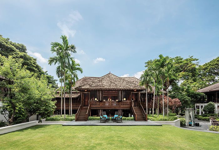 137 Pillars House Chiang Mai, gay-friendly hotel. Traditional Thai wooden house with lush green lawn. Perfect for gay men travel.