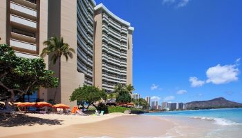 Sheraton Waikiki Beach Resort, a gay-friendly hotel. Beach view with Diamond Head. Perfect for LGBTQ+ travel & gay vacations in Honolulu, Hawaii.