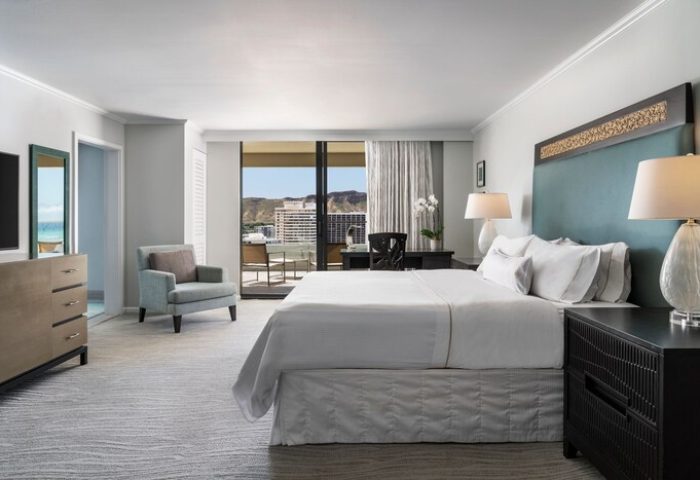 Moana Surfrider, A Westin Resort & Spa, Waikiki Beach gay-friendly hotel room. Ocean view from balcony. Gay travel advice.