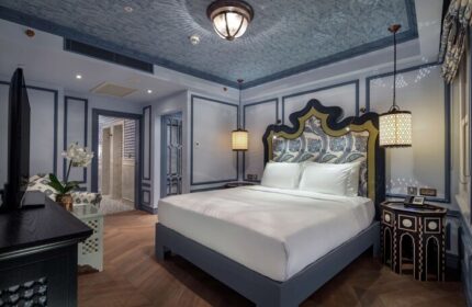 Hagia Sofia Mansions Istanbul, Curio Collection by Hilton: Stylish room in a gay-friendly hotel. Bed, lamps, and decor in blue and white hues.