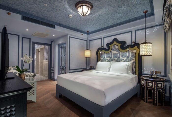 Hagia Sofia Mansions Istanbul, Curio Collection by Hilton: Stylish room in a gay-friendly hotel. Bed, lamps, and decor in blue and white hues.