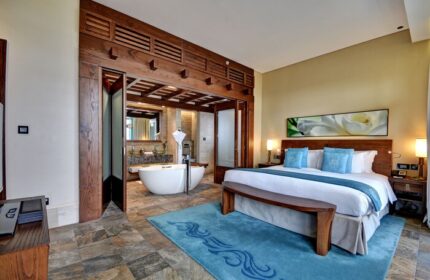 Sofitel Dubai The Palm Resort And Spa gay-friendly hotel room. Luxurious bedroom and bathroom with tub. Perfect for LGBT travel.