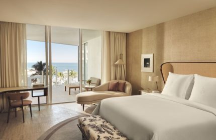 Four Seasons Hotel and Residences Fort Lauderdale, a gay-friendly hotel. Luxurious room with balcony overlooking the ocean. Perfect for gay travel.