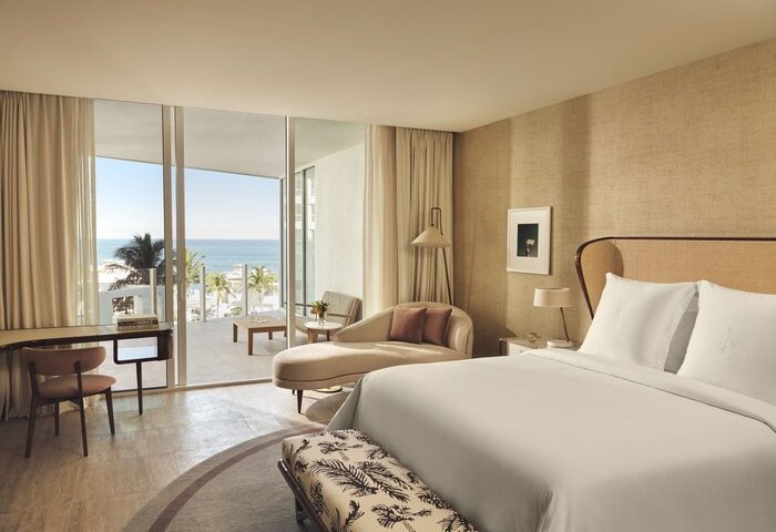 Four Seasons Hotel and Residences Fort Lauderdale, a gay-friendly hotel. Luxurious room with balcony overlooking the ocean. Perfect for gay travel.