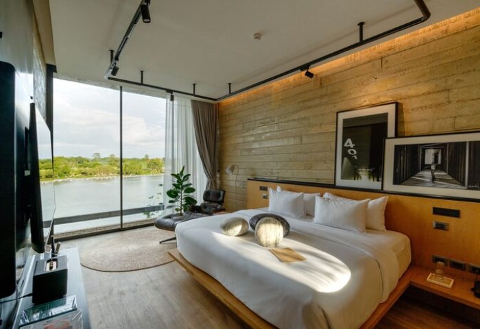 Cross River Kwai gay-friendly hotel room. Modern design, king bed, river view. Perfect for gay men's travel. X2 River Kwai hotel.