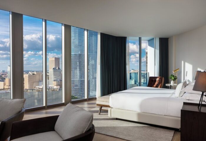 Kimpton EPIC Hotel gay-friendly room. Panoramic city views from a modern, luxurious suite. Ideal for gay travel in Miami.