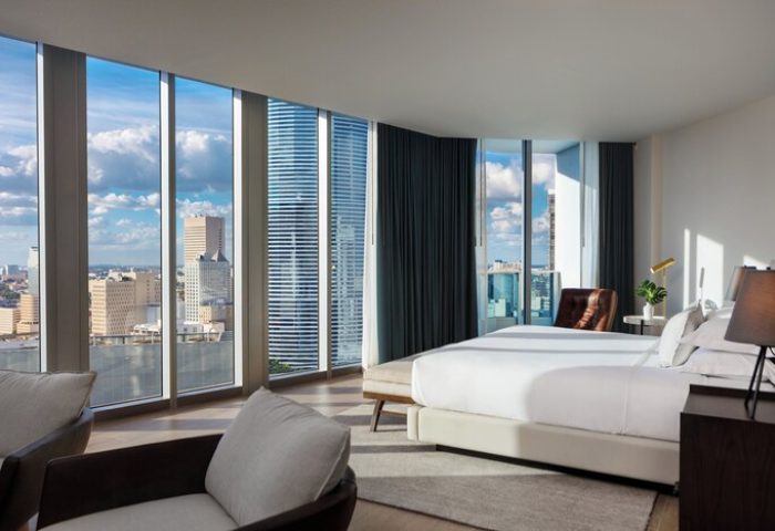 Kimpton EPIC Hotel gay-friendly room. Panoramic city views from a modern, luxurious suite. Ideal for gay travel in Miami.
