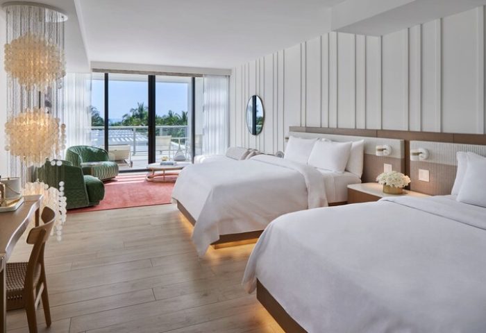 W South Beach gay-friendly hotel room with two beds, balcony, ocean view, and modern decor. Luxury gay travel in Miami.