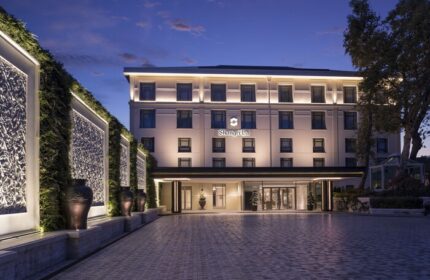 Shangri-La Bosphorus, Istanbul: Exterior view of the gay-friendly hotel at dusk. A luxury travel destination for gay men.