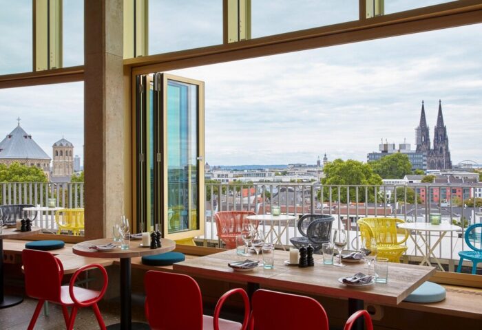 25hours Hotel The Circle's gay-friendly restaurant. Tables set with city views. A great choice for gay men's travel in Cologne.