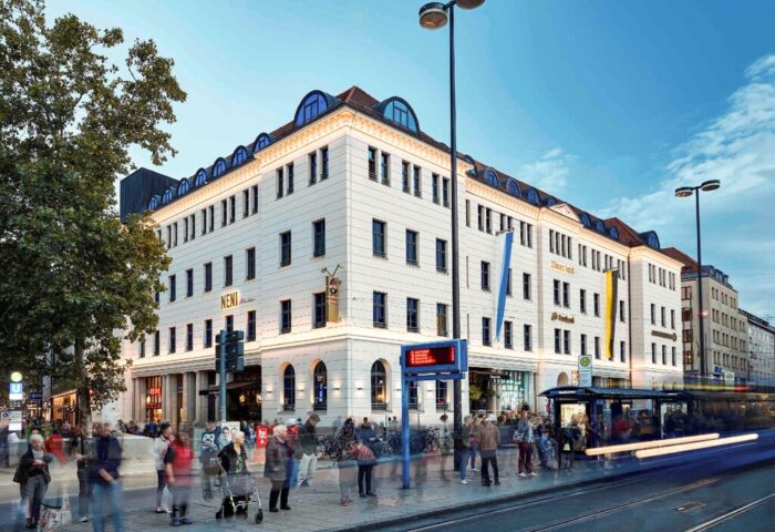 25hours Hotel The Royal Bavarian exterior. Gay-friendly hotel in Munich, Germany. Cityscape view of the hotel, a top travel destination.
