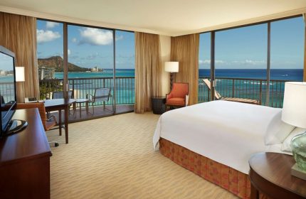 Hilton Hawaiian Village Waikiki Beach Resort gay-friendly hotel room. Balcony view of Diamond Head, ocean. Modern, comfortable, inviting.