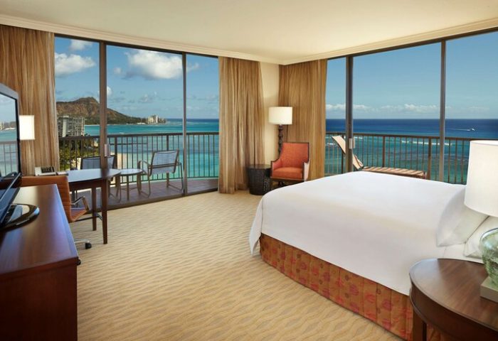 Hilton Hawaiian Village Waikiki Beach Resort gay-friendly hotel room. Balcony view of Diamond Head, ocean. Modern, comfortable, inviting.
