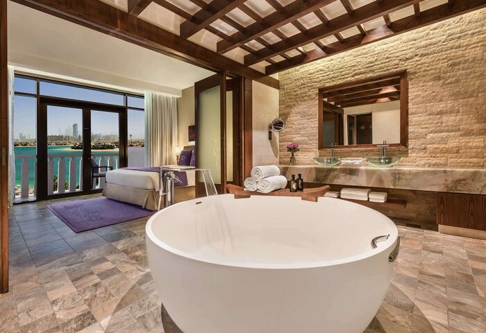 Sofitel Dubai The Palm Resort & Spa: Gay-friendly hotel room with bathtub, balcony, sea view. Luxury travel for gay men in Dubai.