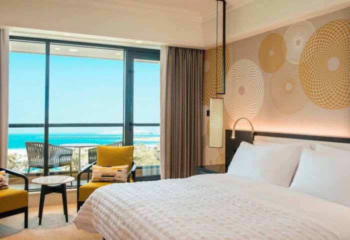 Le Royal Méridien Beach Resort room: Ocean view from this gay-friendly hotel. A luxurious bedroom with balcony seating and a king-size bed.