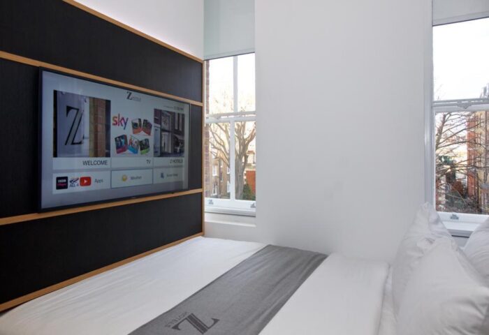 The Z Hotel Trafalgar gay-friendly room: modern design, TV, window view. Ideal for gay travelers seeking comfort in London.