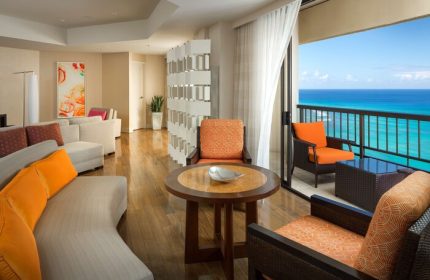 Hyatt Regency Waikiki Beach Resort suite. Gay-friendly hotel room with ocean view balcony. Waikiki travel for gay men. Spa resort interior.