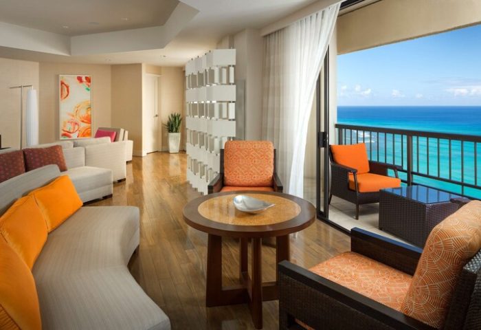 Hyatt Regency Waikiki Beach Resort suite. Gay-friendly hotel room with ocean view balcony. Waikiki travel for gay men. Spa resort interior.