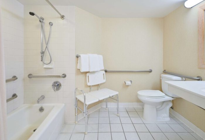 OHANA Waikiki East by OUTRIGGER accessible bathroom. Gay-friendly hotel with grab bars, shower seat, and accessible features.