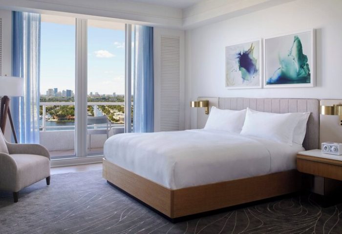 Gay-friendly The Ritz-Carlton, Fort Lauderdale hotel room. Balcony view of the city skyline. Upscale travel for gay men.