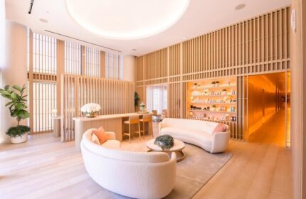 W South Beach hotel's chic, gay-friendly spa lounge. Modern design, light wood accents, and stylish seating. Luxury travel for gay men.