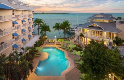 Hyatt Centric Key West Resort pool view. Gay-friendly hotel with spa, palm trees, and ocean. A tropical paradise for gay travelers.